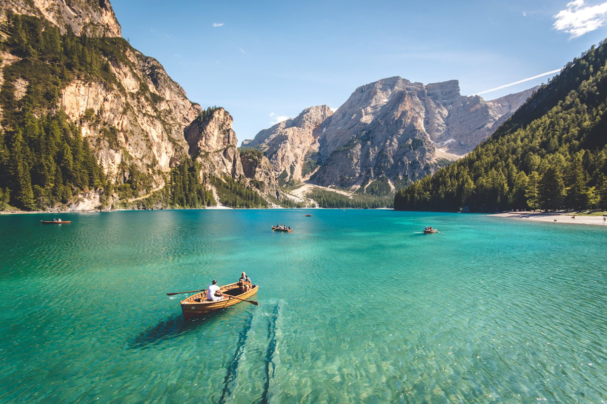 Digital nomad working remotely with a scenic travel backdrop