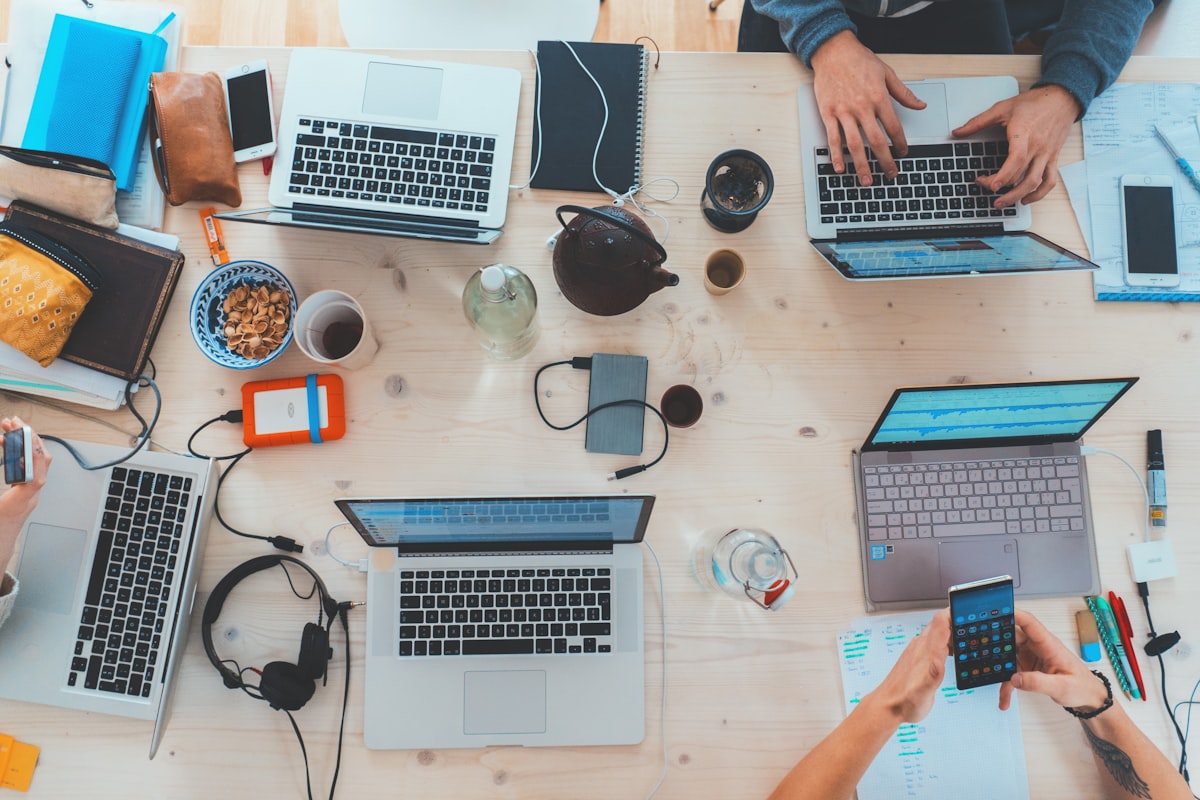 Team working together with technology in modern office